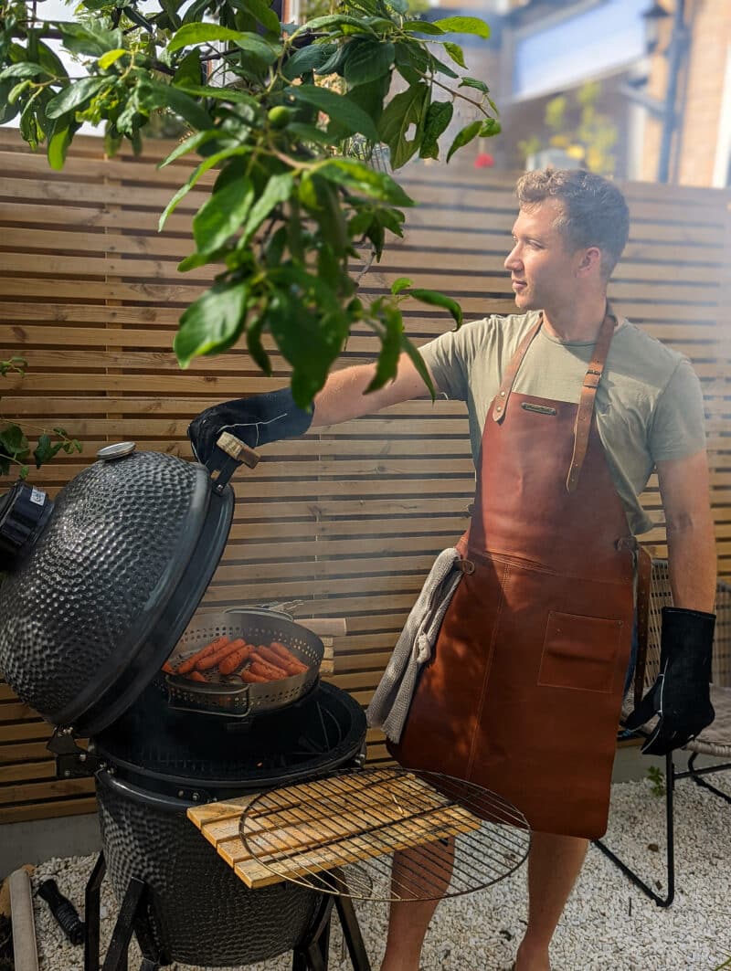 Man Tending BBQ in Basic Rustic Leather Apron